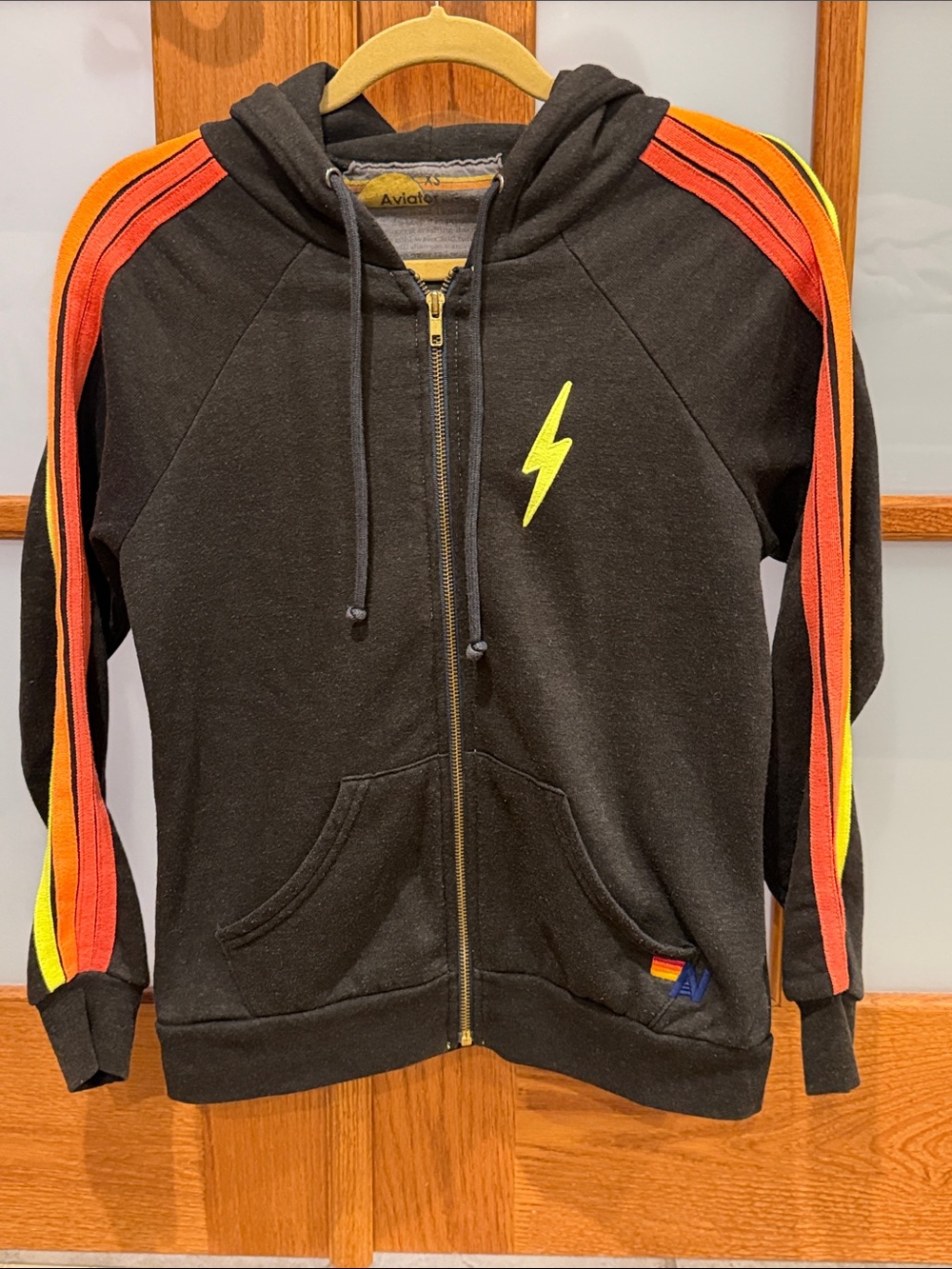 Aviator Nation Black Zip Hoodie with Red, Orange & Yellow Sleeve Stripes - Picture 3 of 7